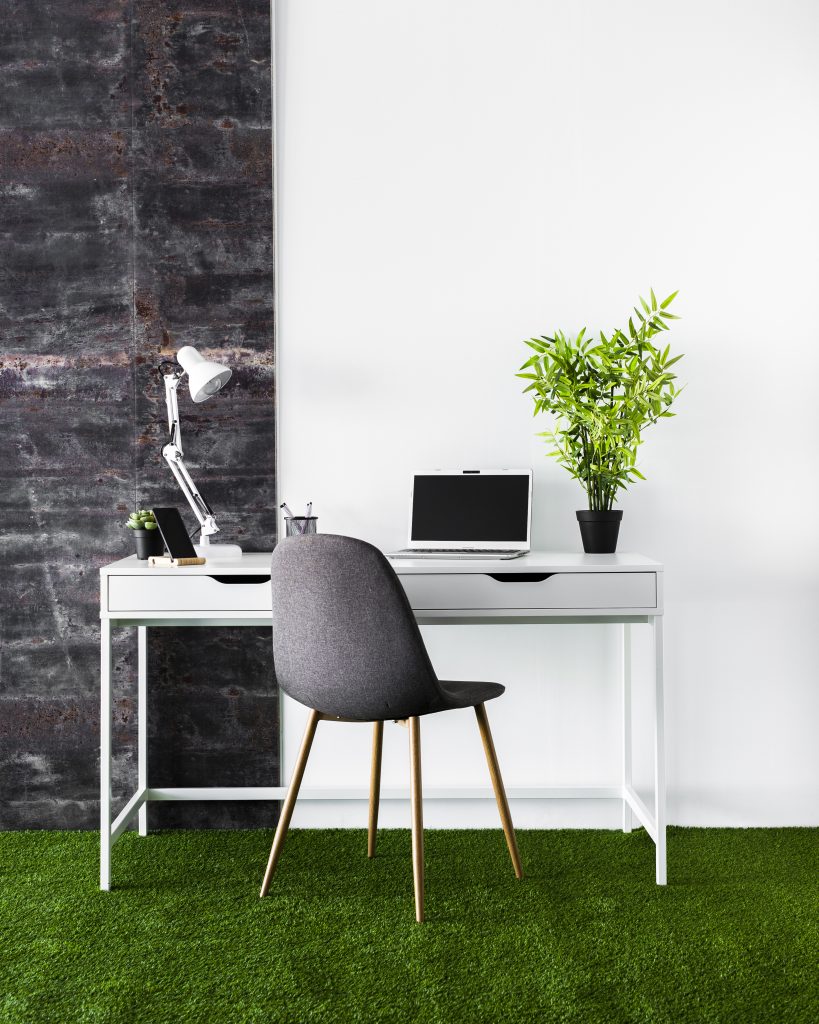 office set up with artificial grass floor