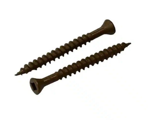 Two golden oak colour-coded screws designed for securing composite decking boards